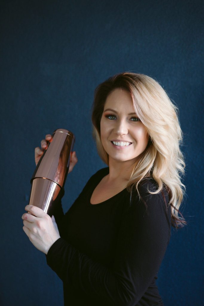 Professional private bartender pouring a craft cocktail for an event in Melbourne, FL.